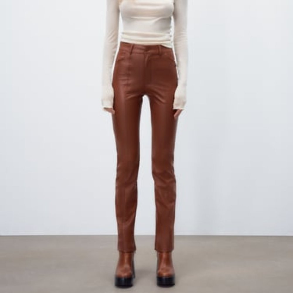 NWT FAUX LEATHER PANTS WITH SLIT.